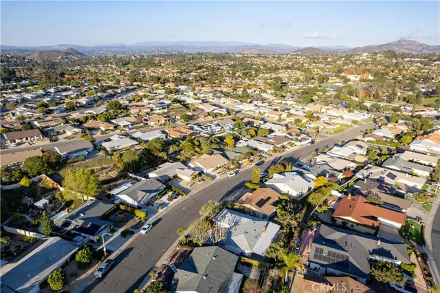 an aerial view of residential building with parking space