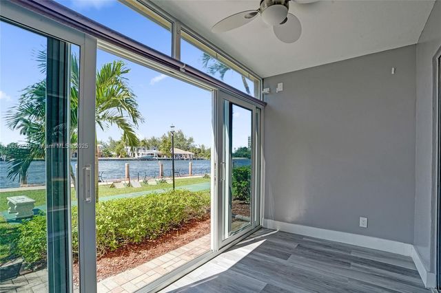 a view of swimming pool with chairs