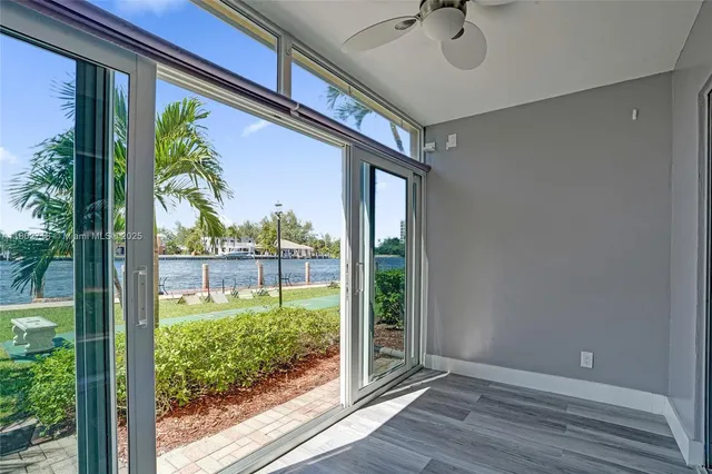 a view of swimming pool with chairs