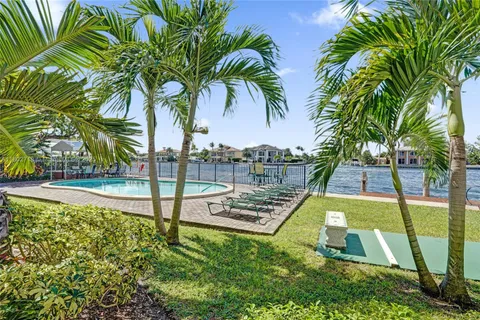 a view of a park with palm trees