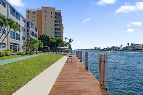 a view of a garden with a apartment