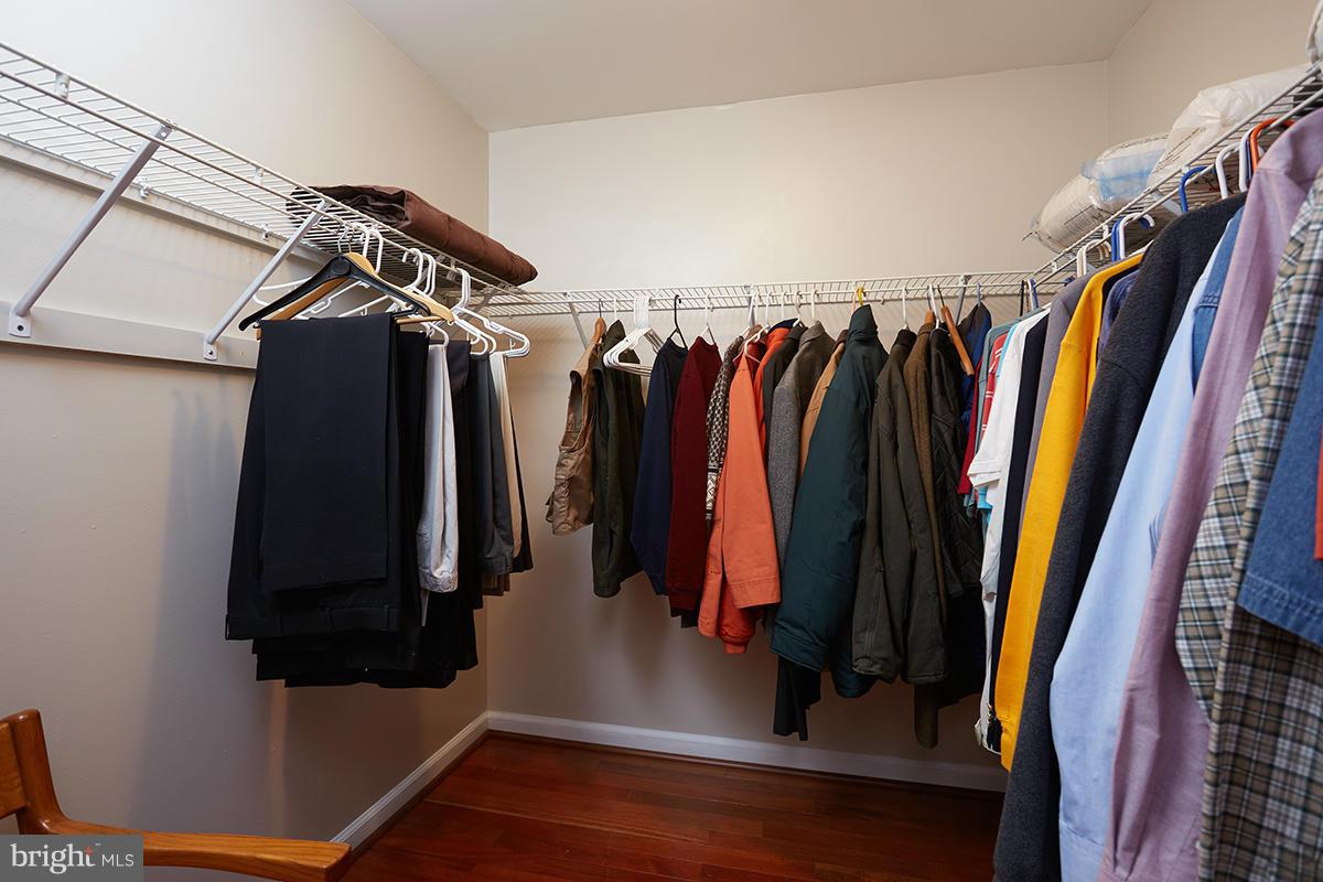 115 Timberbrook Lane, Unit 104 Gaithersburg, MD 20878 - Photo 14 of 28 a view of walk in closet with clothes