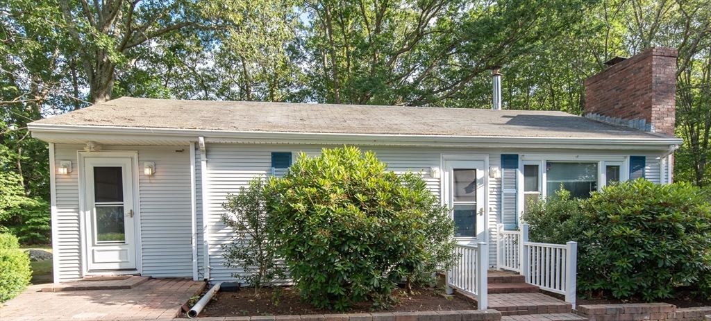 2 Raymond Street North Smithfield, RI 02896 - Photo 15 of 18 a view of house with trees in front of it