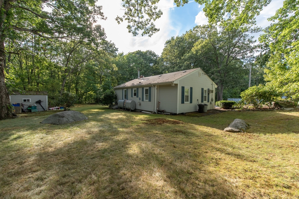 2 Raymond Street North Smithfield, RI 02896 - Photo 16 of 18 a view of an house with backyard space and balcony