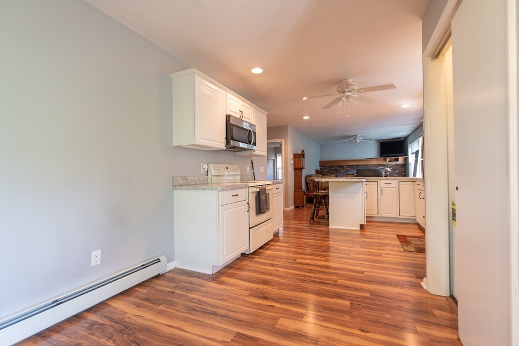 2 Raymond Street North Smithfield, RI 02896 - Photo 5 of 18 a view of kitchen with wooden floor