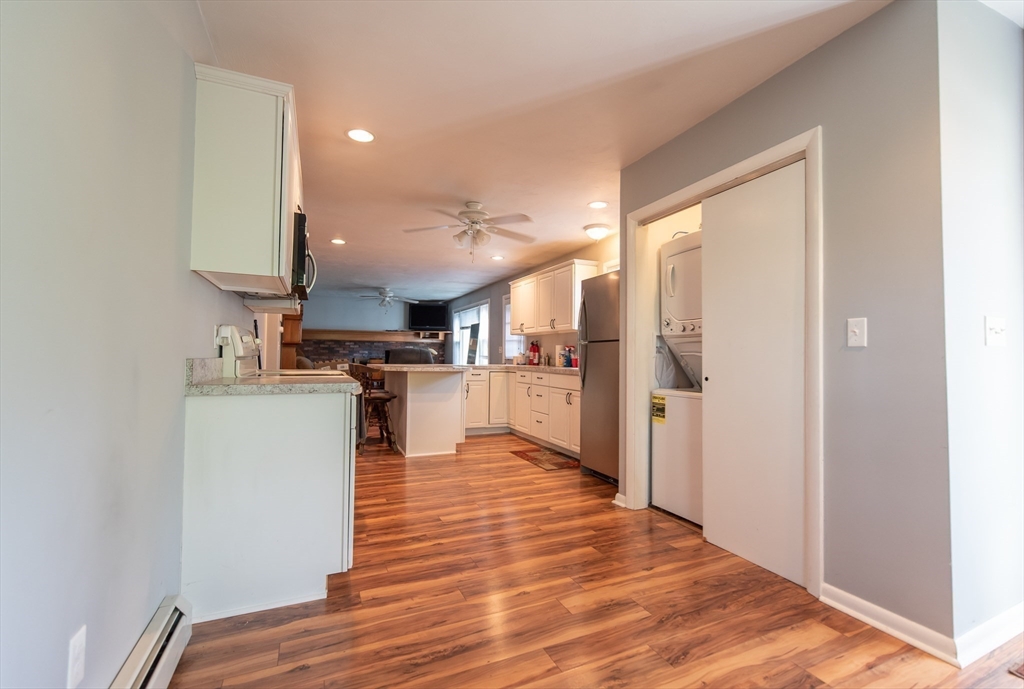 2 Raymond Street North Smithfield, RI 02896 - Photo 6 of 18 a view of kitchen with wooden floor