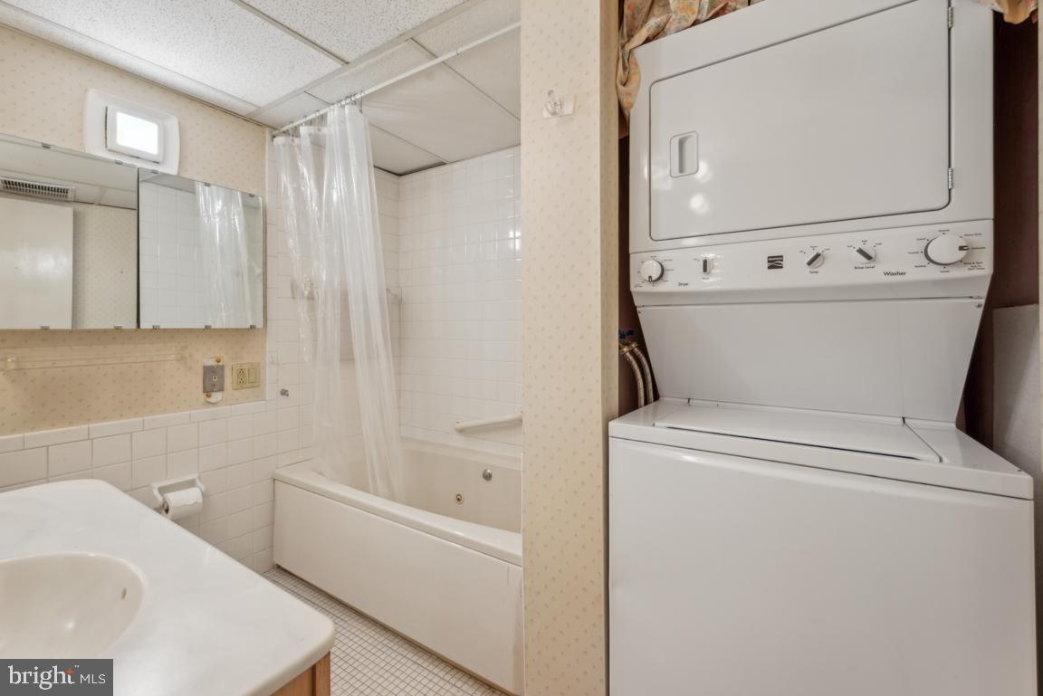 25 Church Road, Unit 150 Maple Shade, NJ 08052 - Photo 21 of 22 a bathroom with a sink a toilet and shower