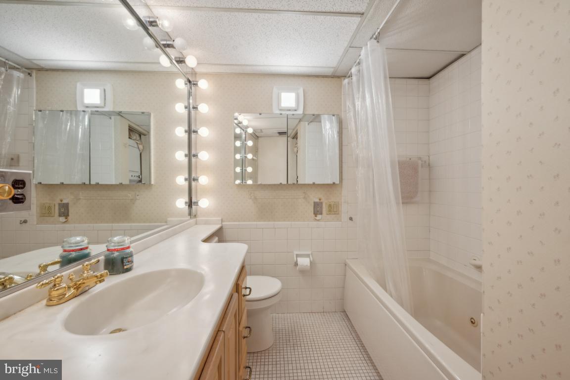 25 Church Road, Unit 150 Maple Shade, NJ 08052 - Photo 22 of 22 a bathroom with a sink a toilet and shower