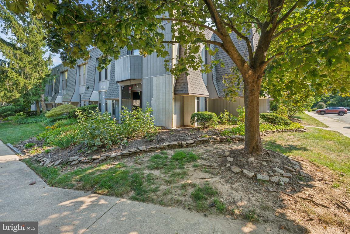 25 Church Road, Unit 150 Maple Shade, NJ 08052 - Photo 3 of 22 a view of a house with a garden