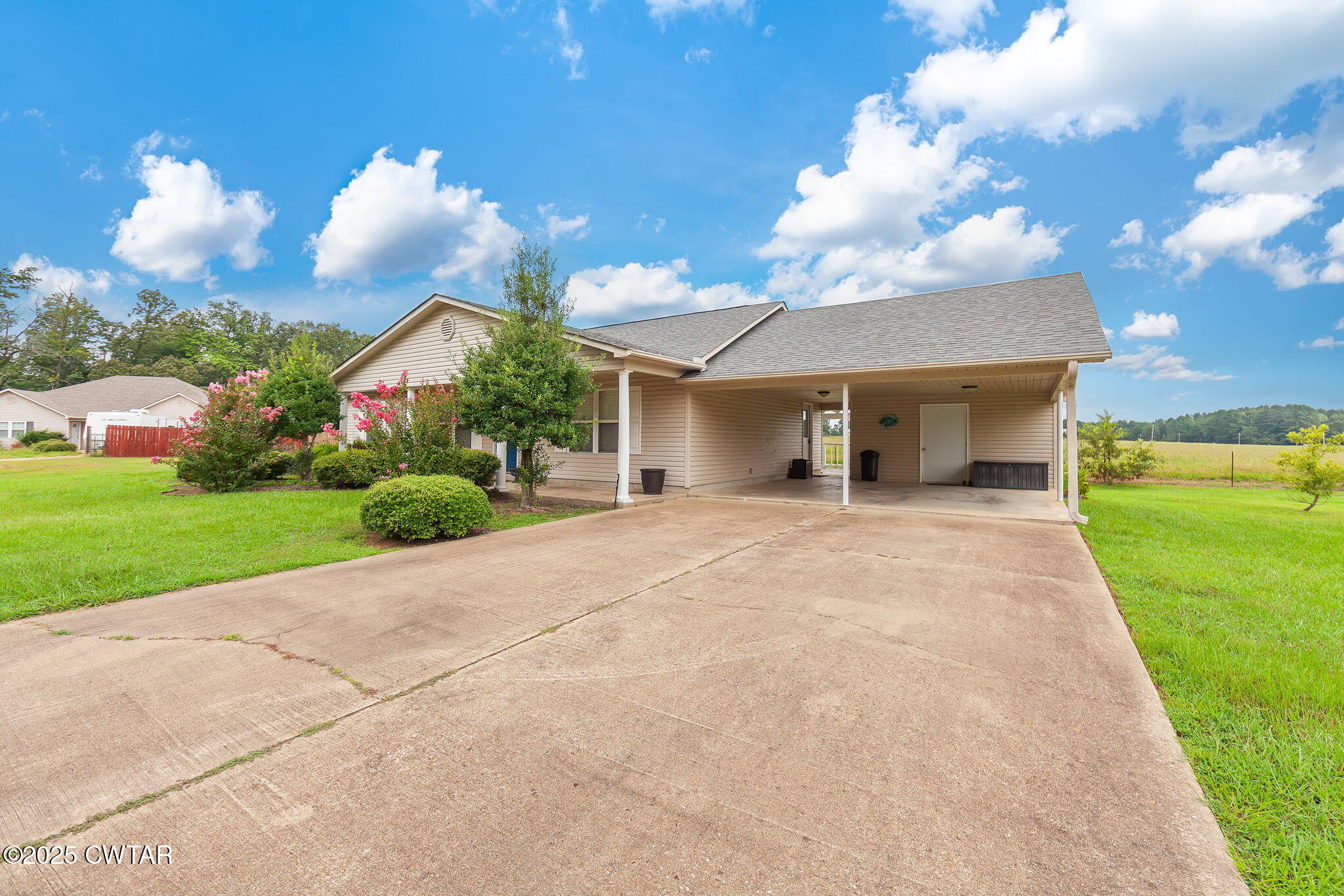 114 Falcon Cove Middleton, TN 38052 - Photo 17 of 24 a view of a house with a yard