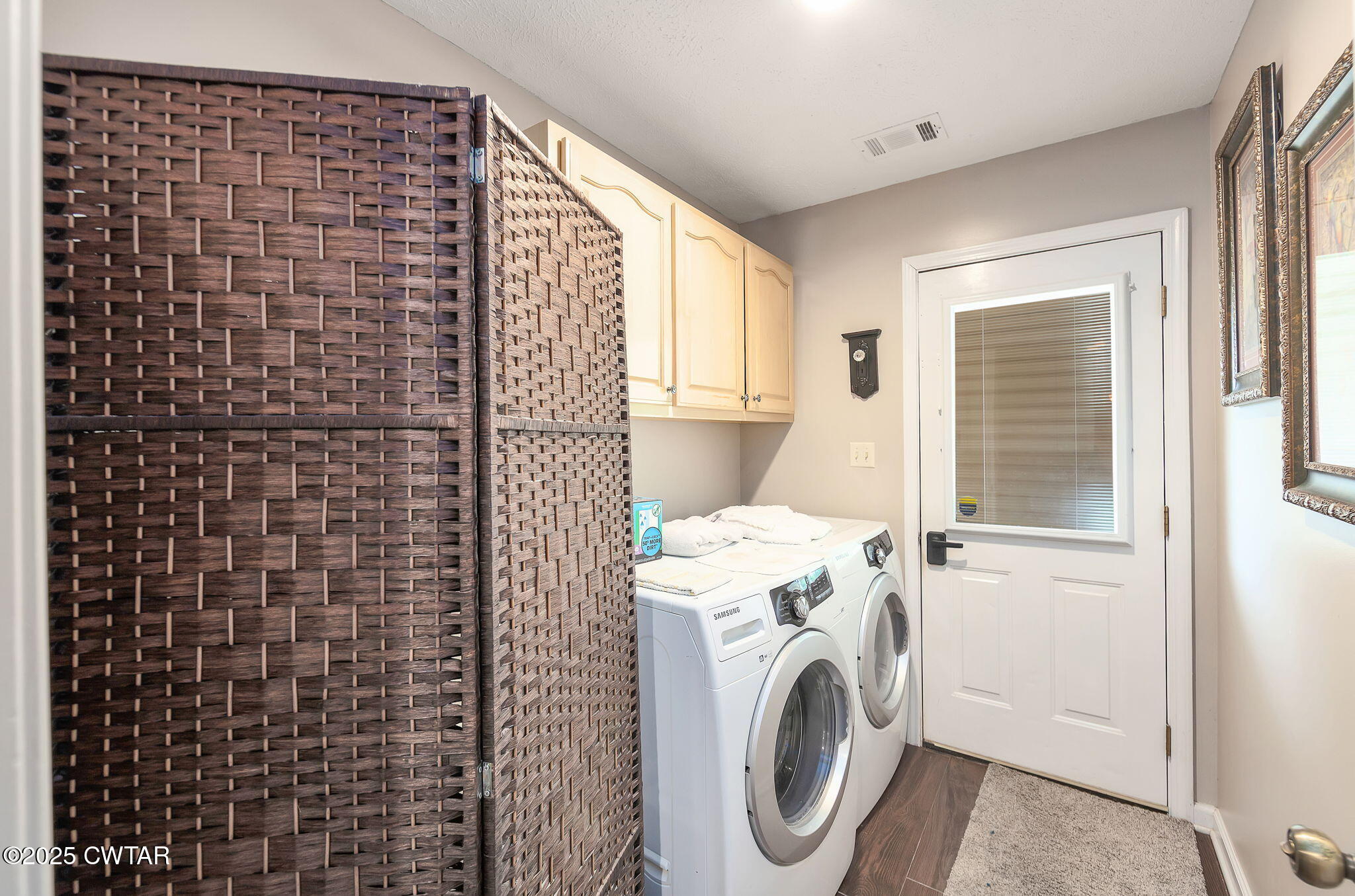 114 Falcon Cove Middleton, TN 38052 - Photo 2 of 24 a utility room with dryer and washer