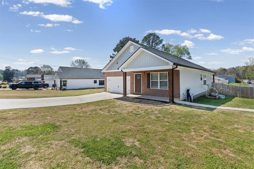 62 Dude Street Northwest Rome, GA 30165 - Photo 19 of 21 a view of a house with a patio