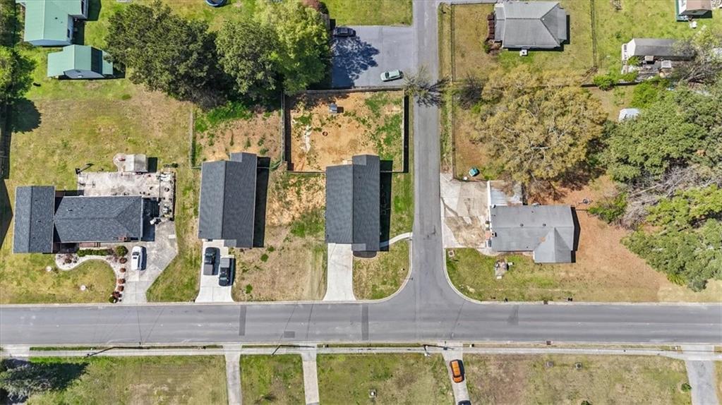 62 Dude Street Northwest Rome, GA 30165 - Photo 20 of 21 an aerial view of a house with a yard and large trees