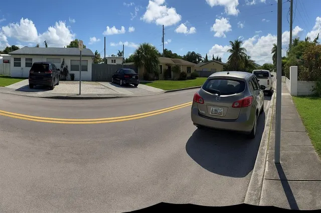 a kitchen with a table and chairs