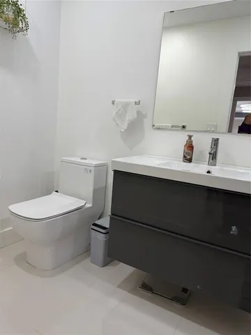 a bathroom with sink and bathtub