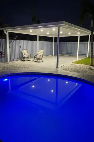 a view of living room with furniture and a flat screen tv