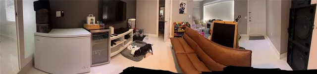 a view of a workspace with furniture