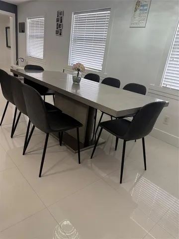 a kitchen with stainless steel appliances granite countertop a sink and a stove top oven