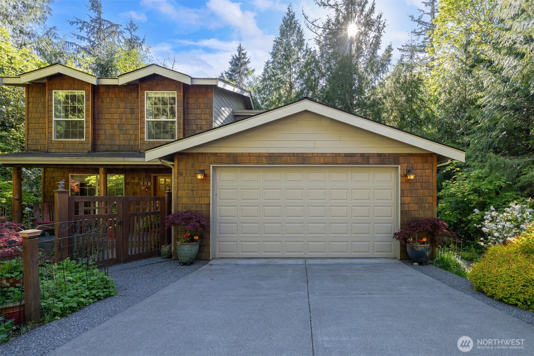 337 Sudden Valley Drive Bellingham, WA 98229 - Photo 2 of 40 a front view of a house with a yard and garage