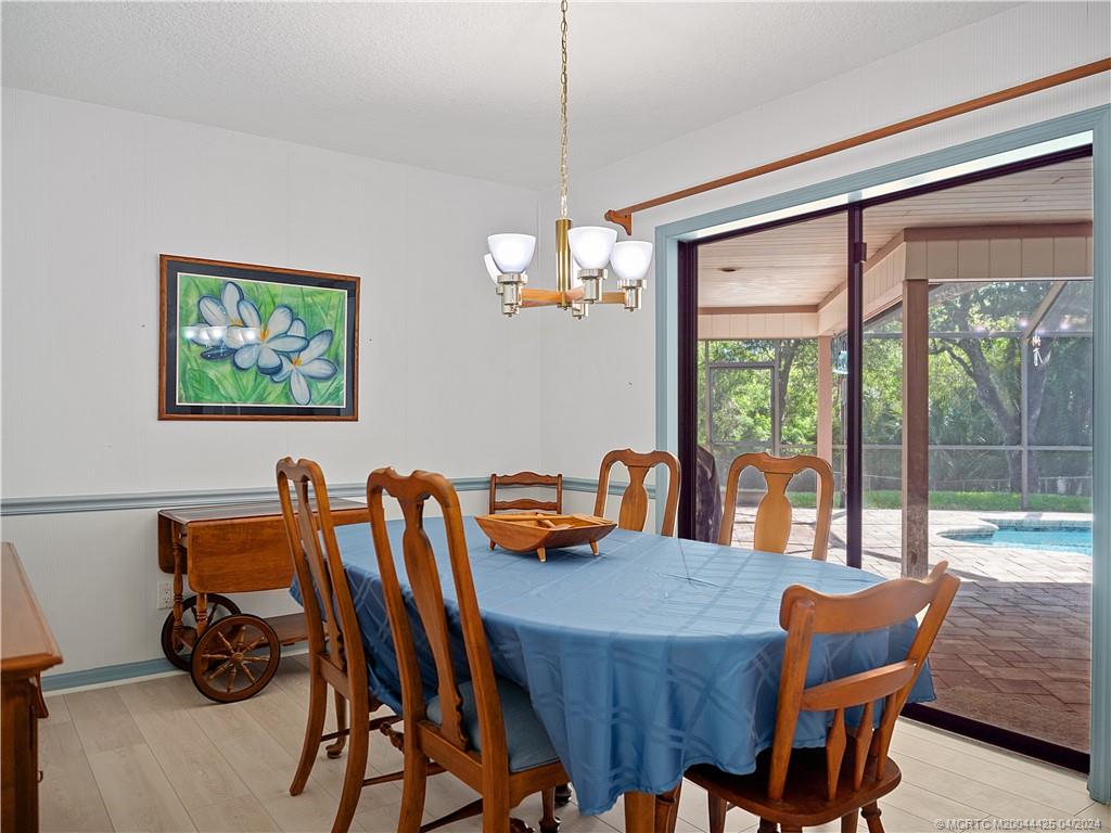 1623 Southwest Gregor Way Stuart, FL 34997 - Photo 21 of 42 Formal Dining with a View