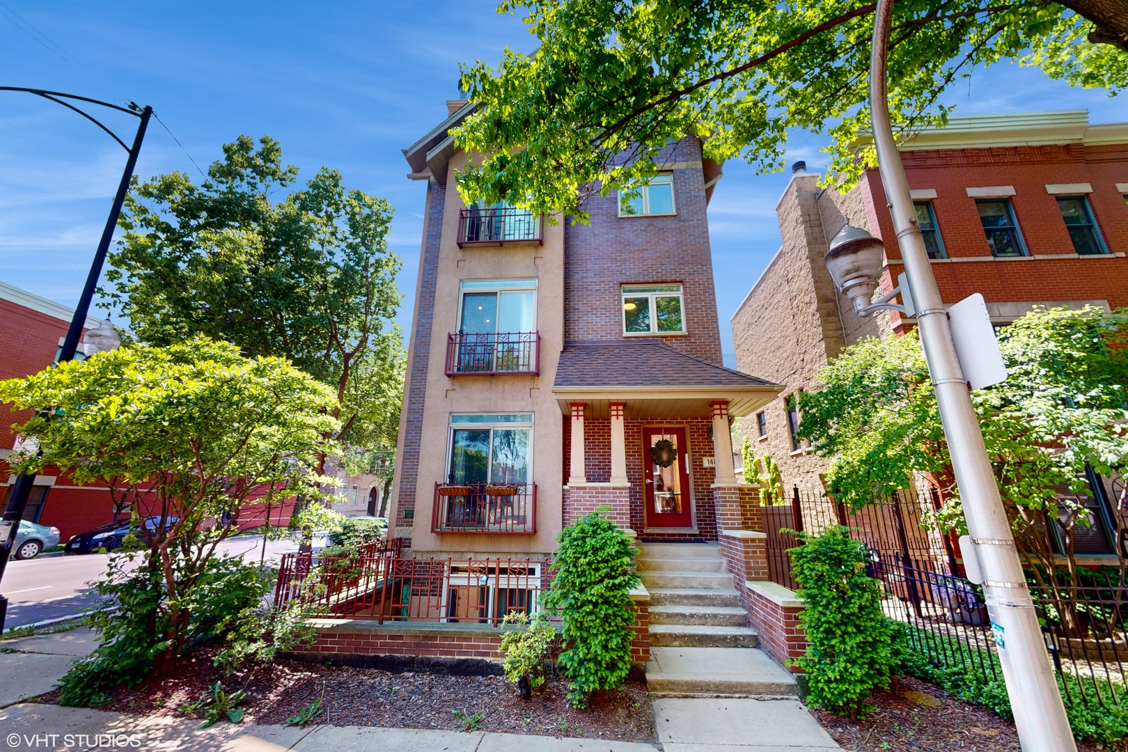 1401 West Fillmore Street, Unit 2 Chicago, IL 60607 - Photo 1 of 26 a front view of a house