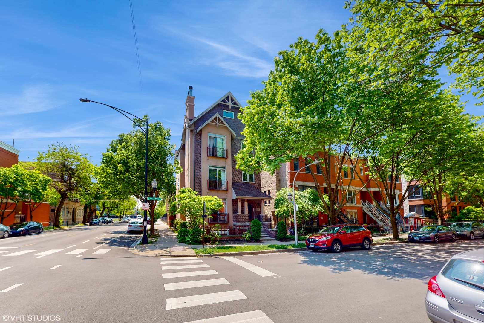 1401 West Fillmore Street, Unit 2 Chicago, IL 60607 - Photo 2 of 26 a view of a street with cars
