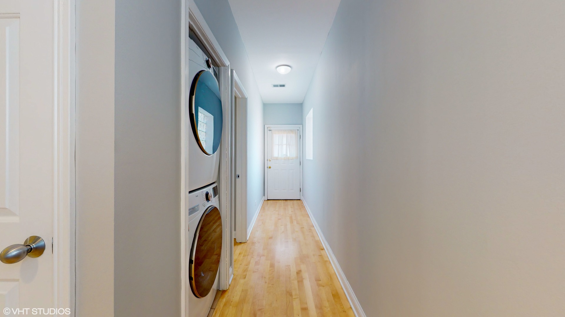 1401 West Fillmore Street, Unit 2 Chicago, IL 60607 - Photo 23 of 26 a view of hallway with washer and dryer