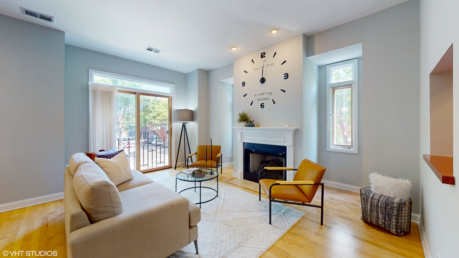 1401 West Fillmore Street, Unit 2 Chicago, IL 60607 - Photo 4 of 26 a living room with furniture and a fireplace