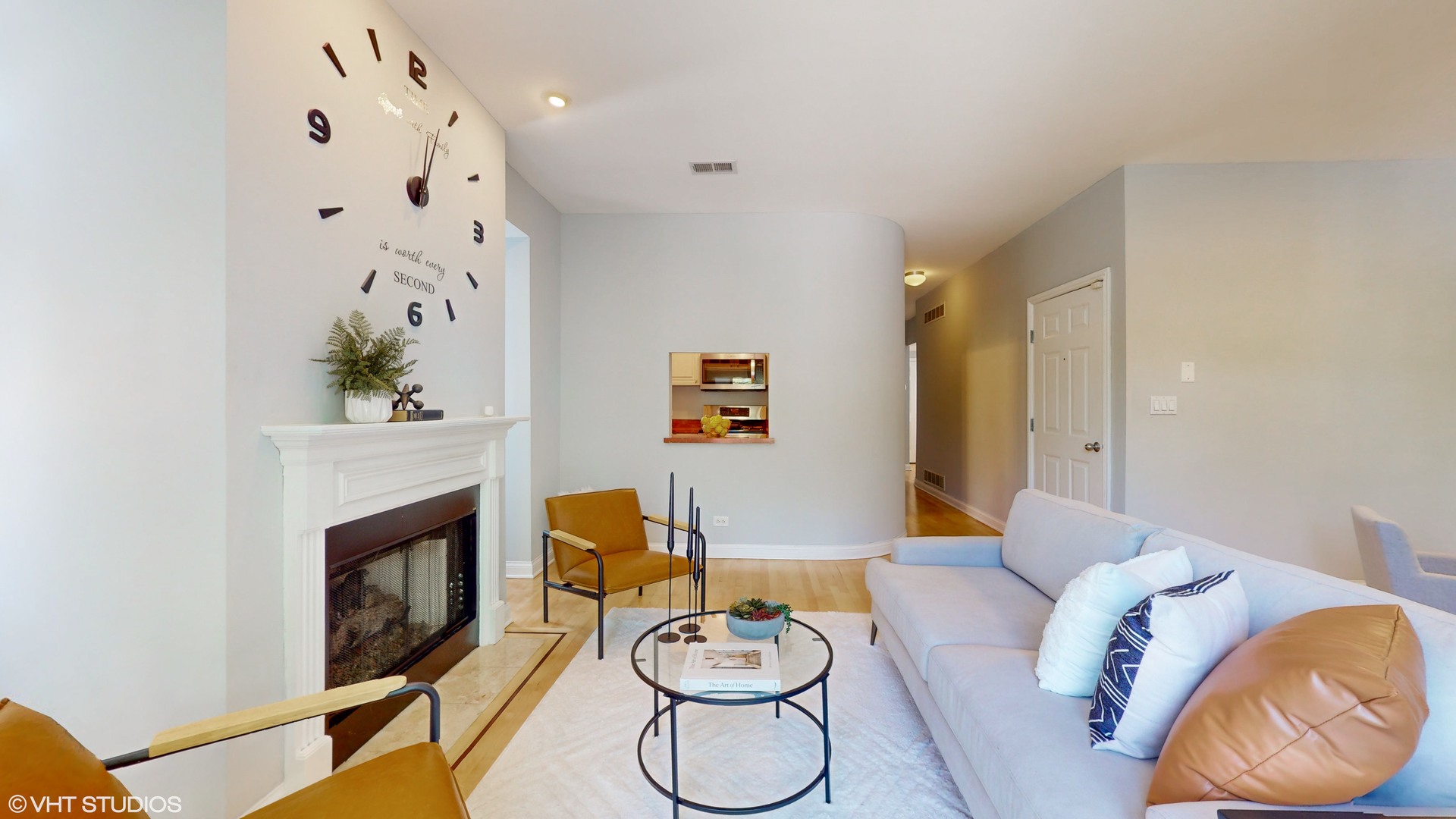 1401 West Fillmore Street, Unit 2 Chicago, IL 60607 - Photo 5 of 26 a living room with furniture and a fireplace