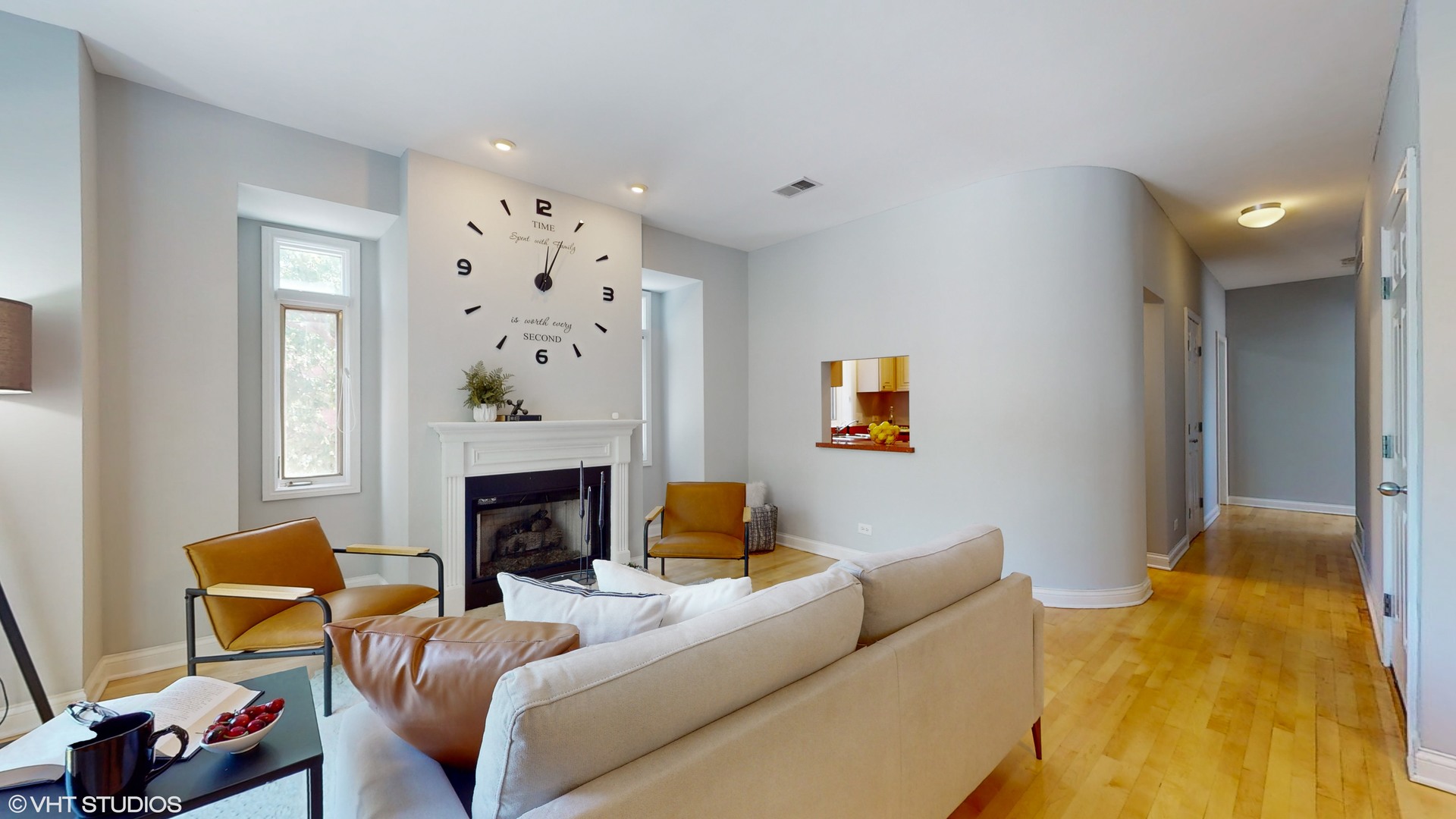 1401 West Fillmore Street, Unit 2 Chicago, IL 60607 - Photo 6 of 26 a living room with furniture fireplace and a window