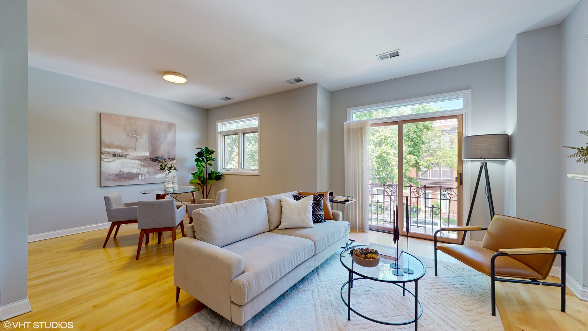 1401 West Fillmore Street, Unit 2 Chicago, IL 60607 - Photo 7 of 26 a living room with furniture and a large window
