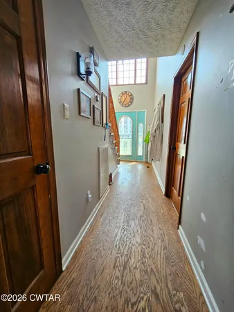 a bathroom with a toilet a sink and a mirror