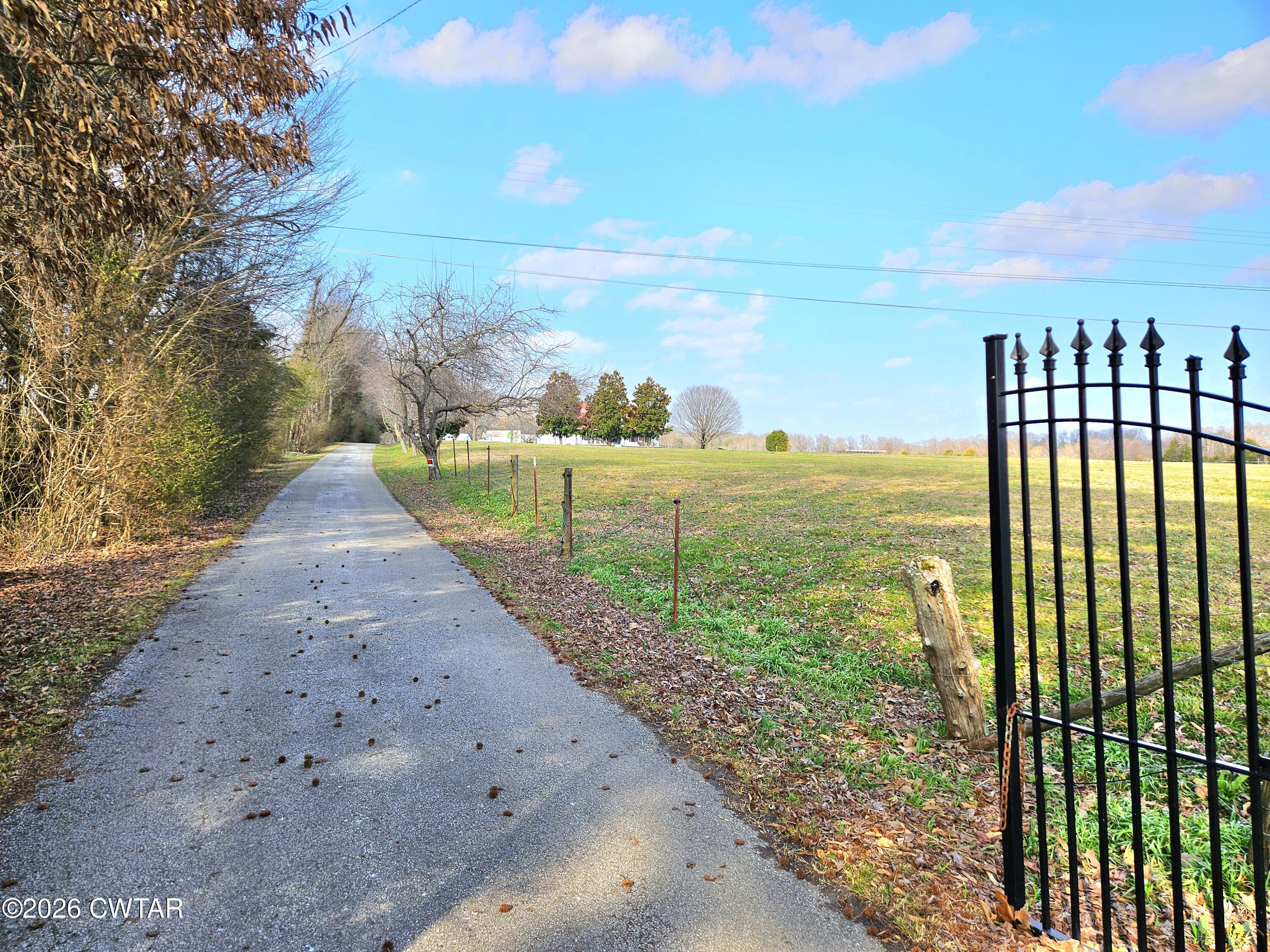 103 Spring Creek Law Road Jackson, TN 38305 - Photo 2 of 35 a view of a yard with an ocean view
