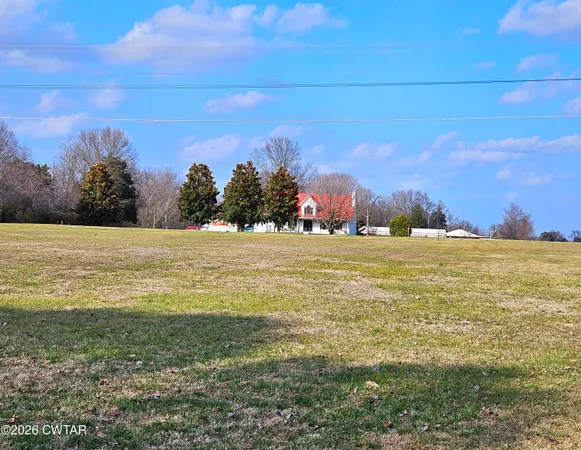 a front view of a house with swimming pool