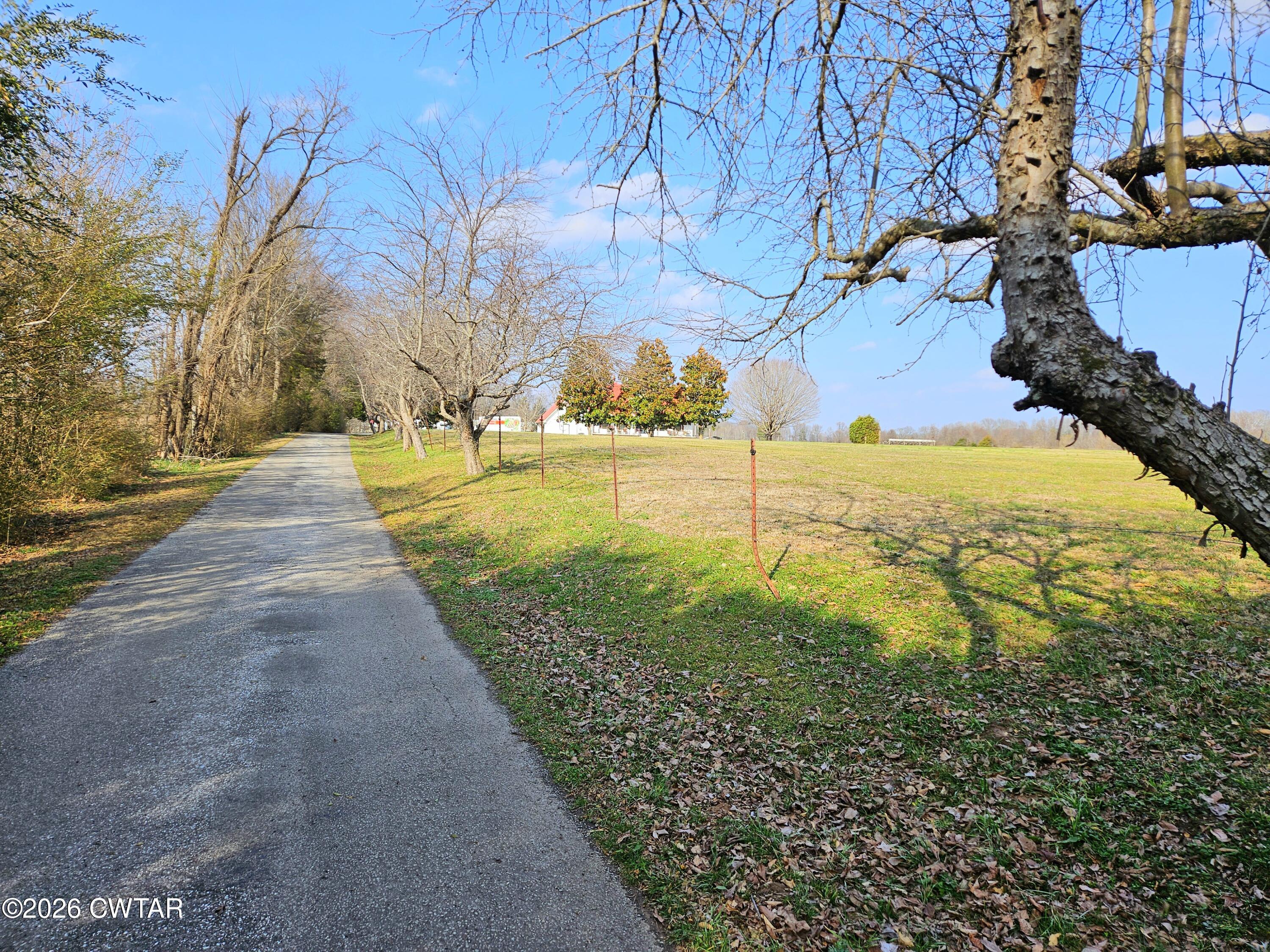 103 Spring Creek Law Road Jackson, TN 38305 - Photo 27 of 35 a view of an outdoor space and a yard