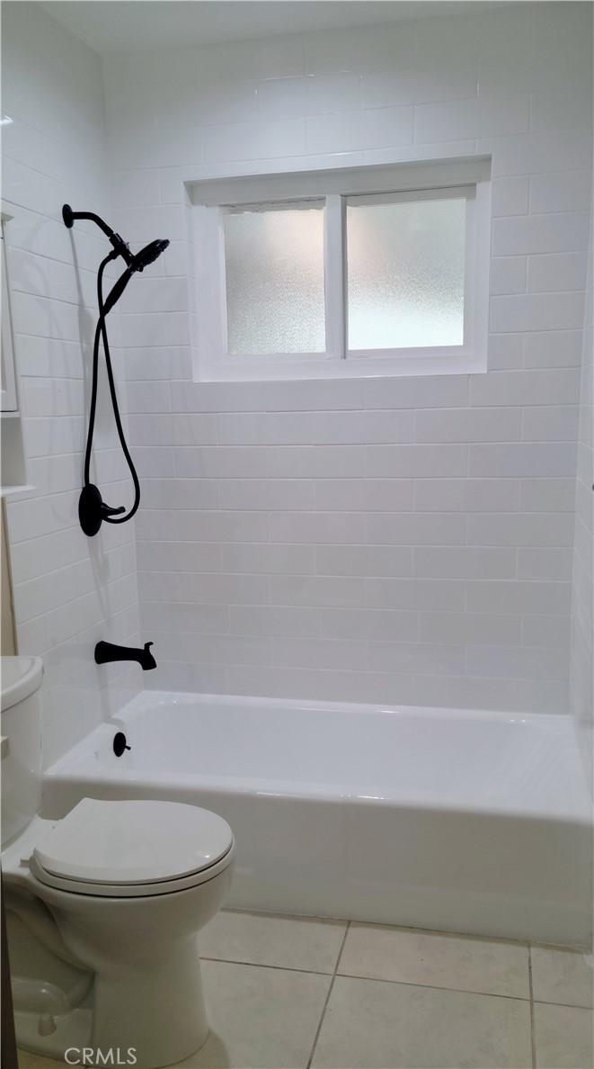 1309 Stillman Avenue Redlands, CA 92374 - Photo 15 of 23 a bathroom with a toilet and a bathtub