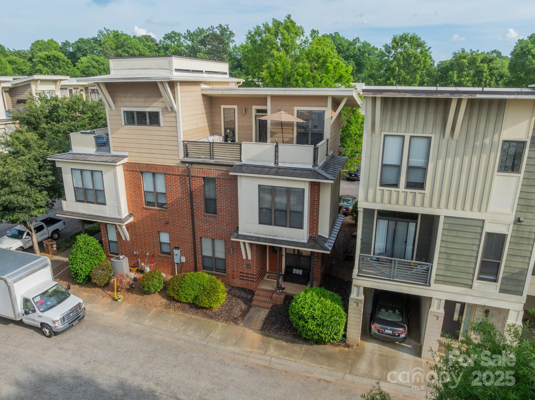 2988 Textile Way Charlotte, NC 28205 - Photo 1 of 36 a front view of a house with a yard