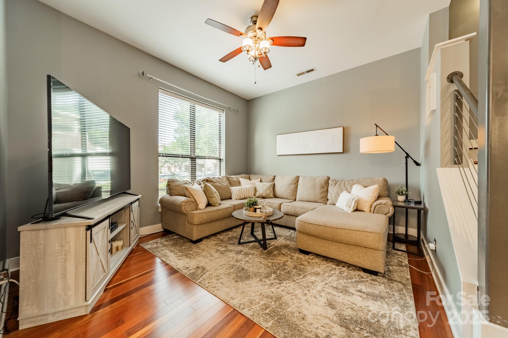 2988 Textile Way Charlotte, NC 28205 - Photo 12 of 36 a living room with furniture fireplace and a large window