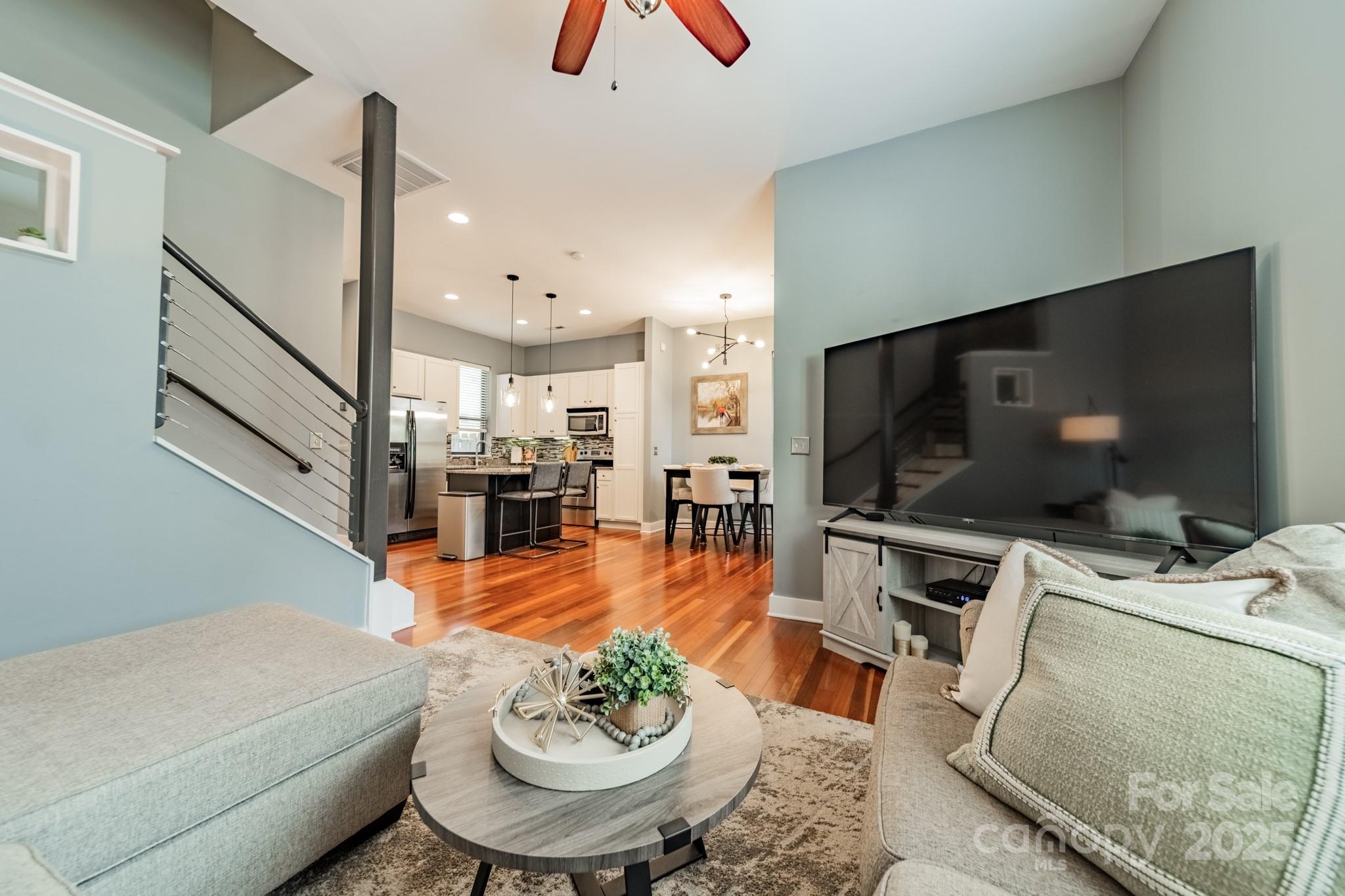 2988 Textile Way Charlotte, NC 28205 - Photo 13 of 36 a living room with furniture and a flat screen tv