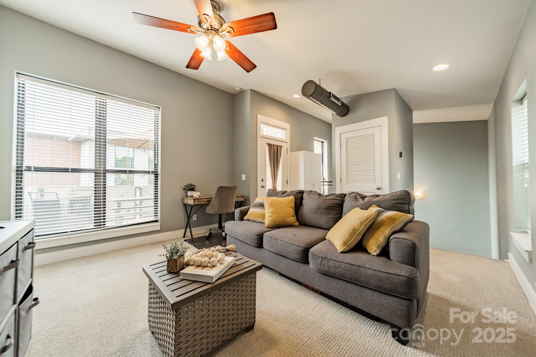 2988 Textile Way Charlotte, NC 28205 - Photo 22 of 36 a living room with furniture and a large window