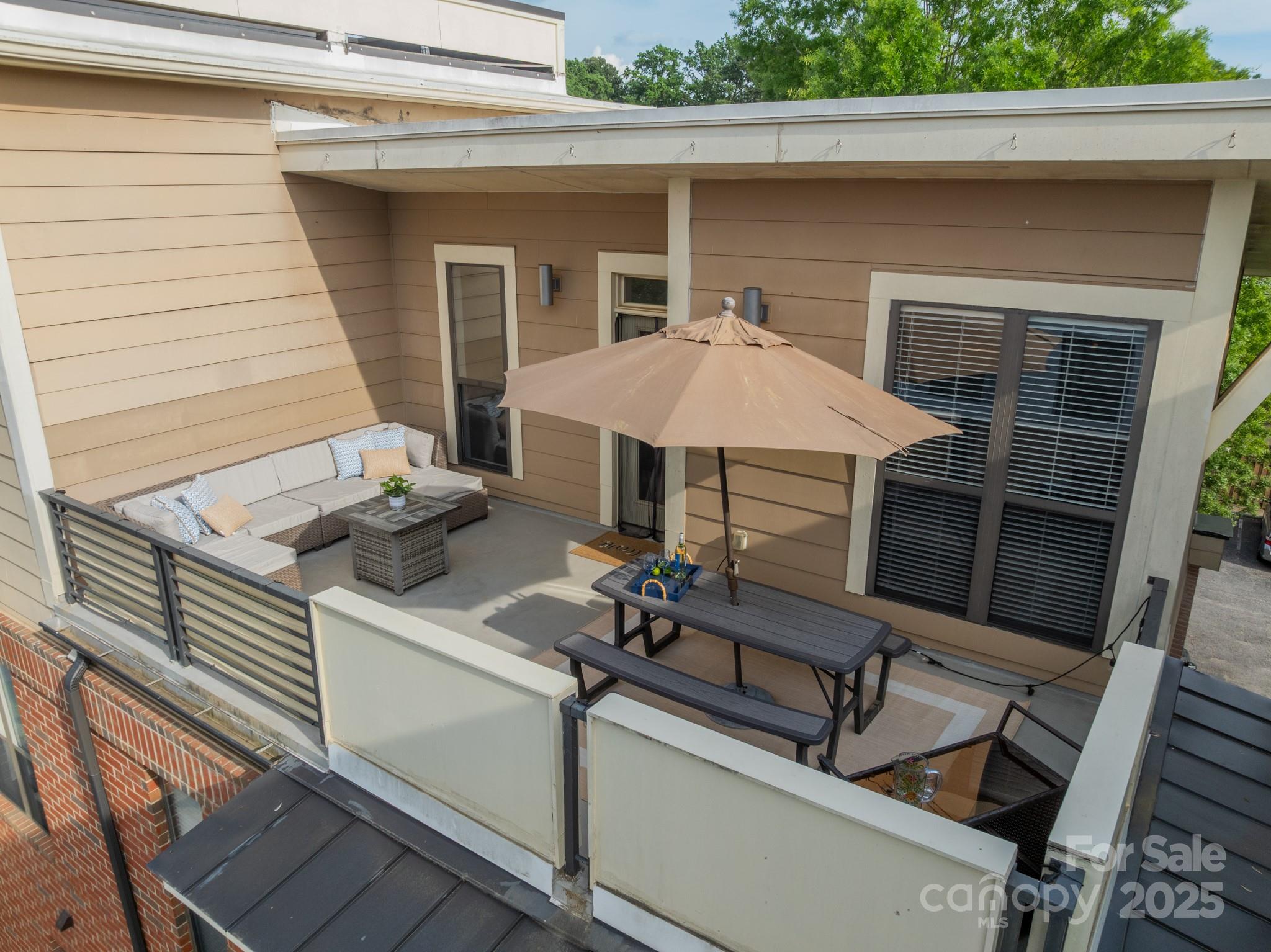 2988 Textile Way Charlotte, NC 28205 - Photo 33 of 36 a view of house with outdoor space and seating area
