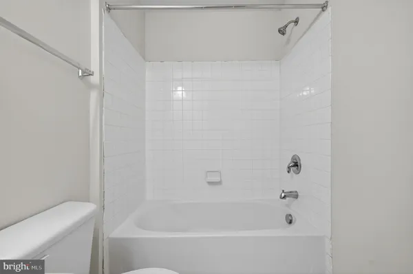a close view of a bathtub in bathroom