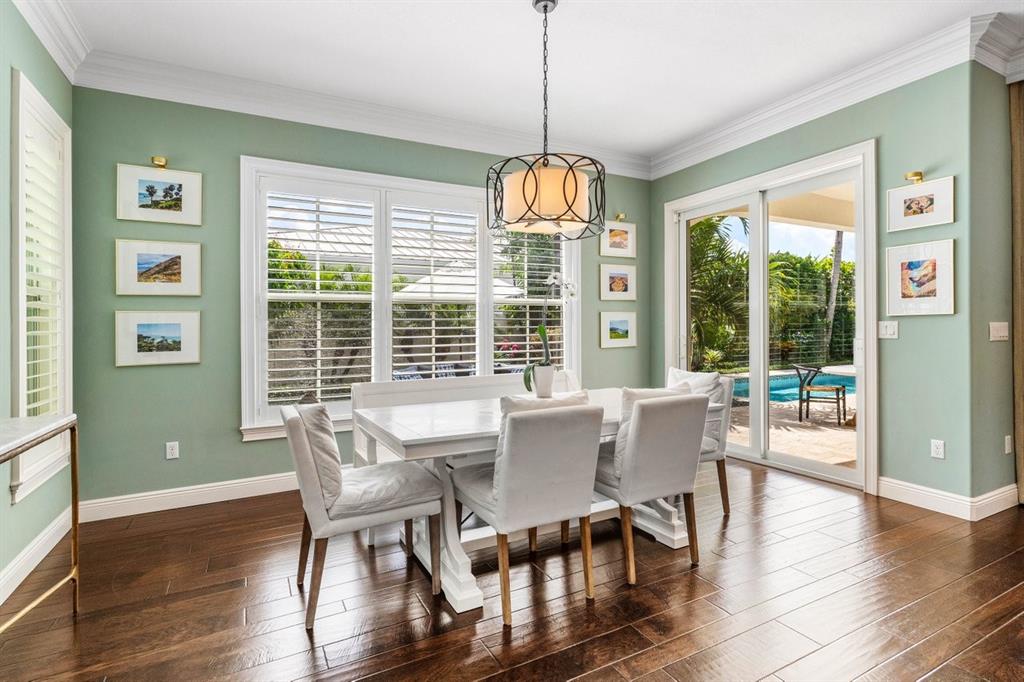 624 Northeast 3rd Avenue Boca Raton, FL 33432 - Photo 17 of 64 a view of a dining room with furniture window and wooden floor