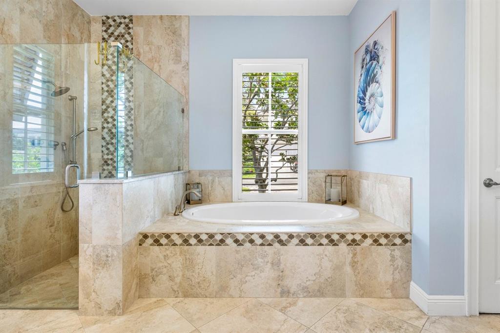 624 Northeast 3rd Avenue Boca Raton, FL 33432 - Photo 25 of 64 a bedroom with a bed and a painting on the wall