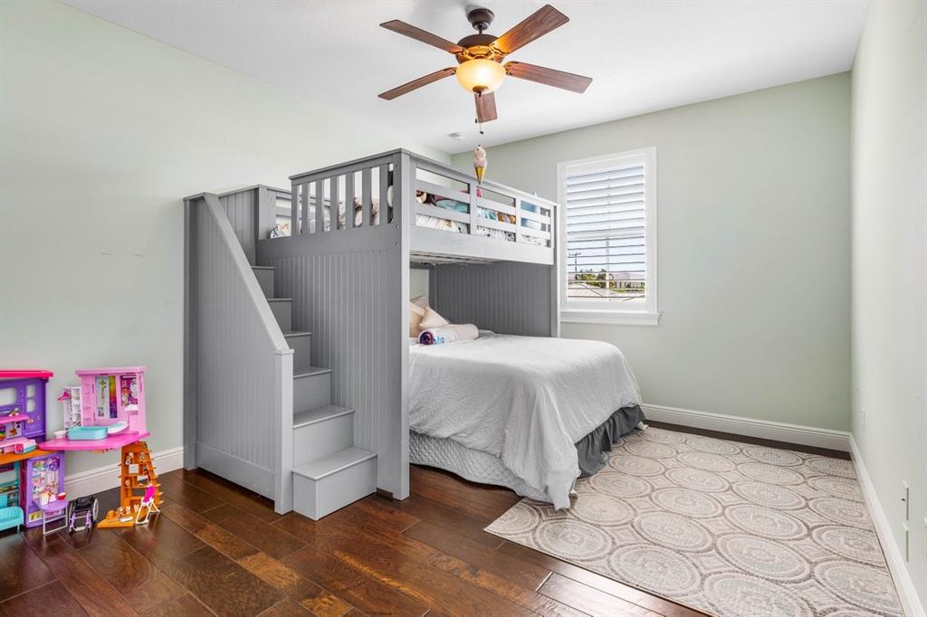 624 Northeast 3rd Avenue Boca Raton, FL 33432 - Photo 31 of 64 a bedroom with a bed and a window