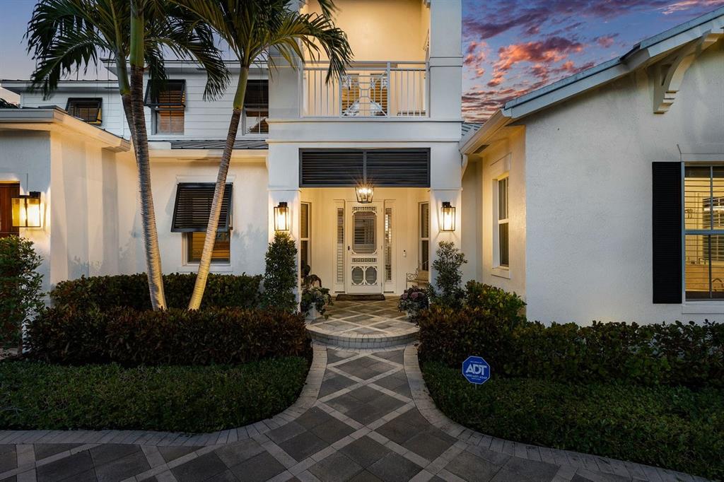 624 Northeast 3rd Avenue Boca Raton, FL 33432 - Photo 5 of 64 a front view of a house with garden