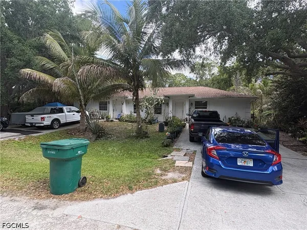 a car parked in front of a house
