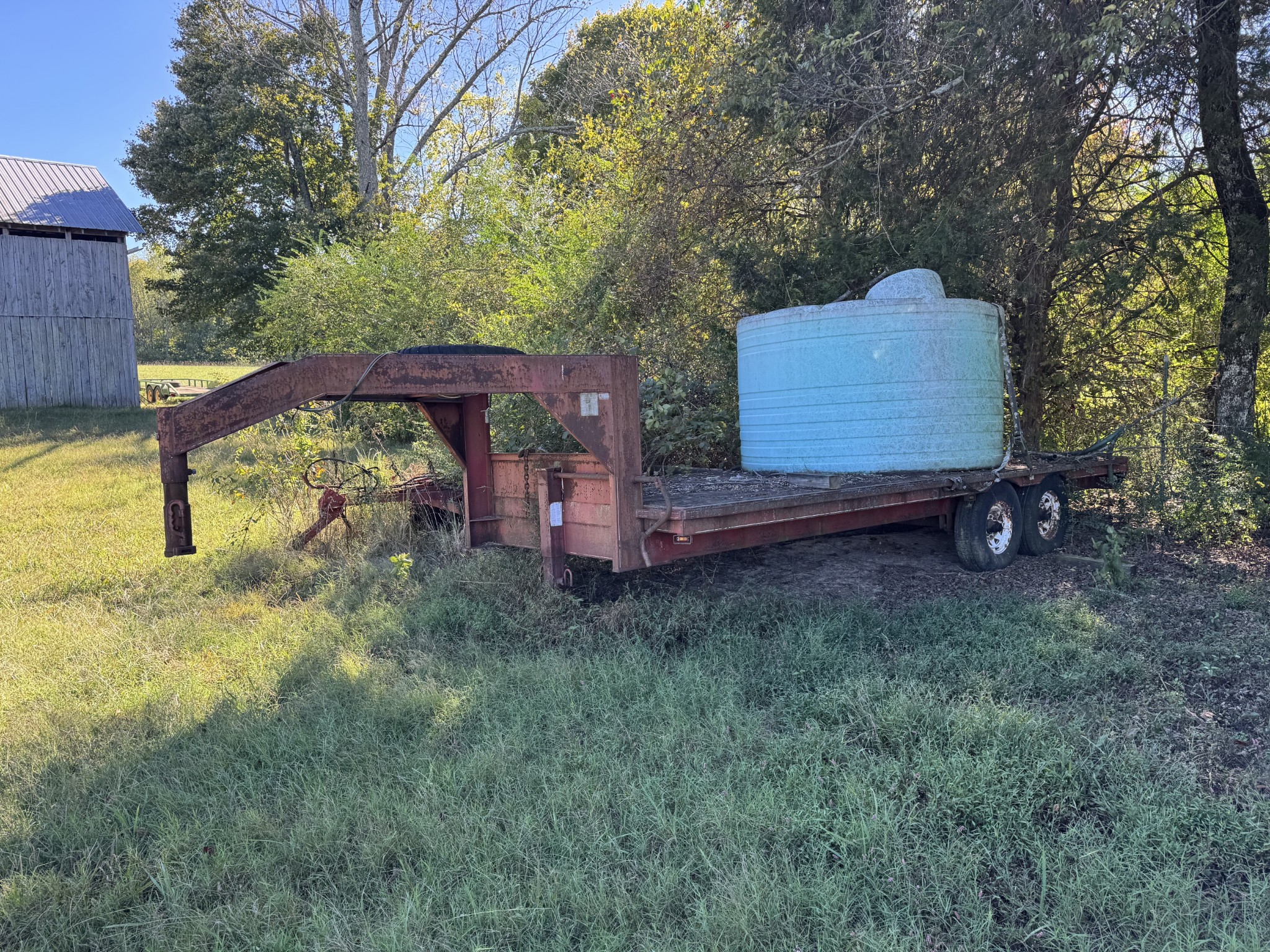 0 Academy Road Portland, TN 37148 - Photo 24 of 31 a backyard of a house with barbeque oven table and chairs
