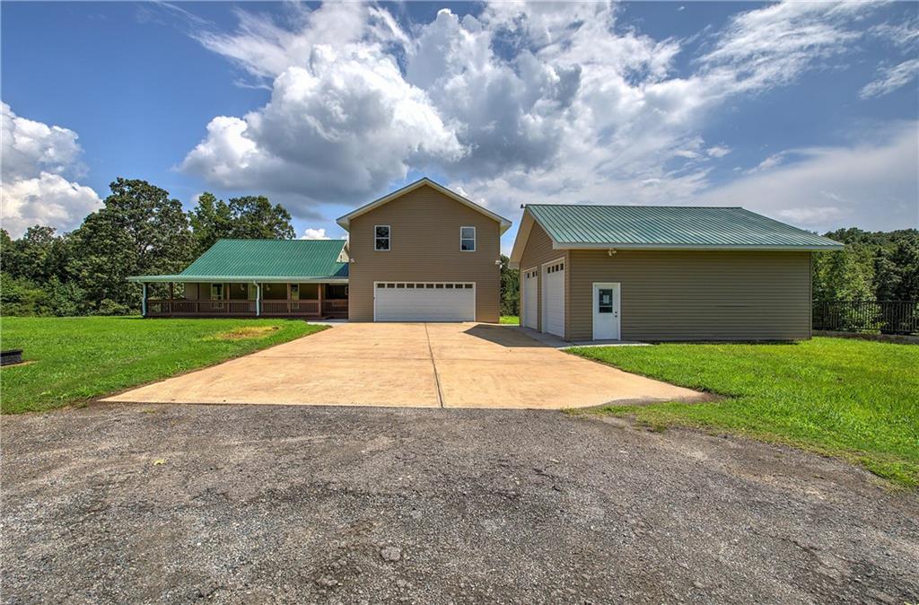 a house with yard in front of it