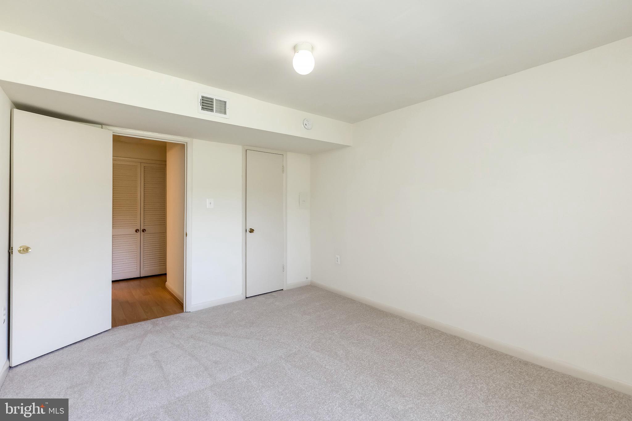 11601 Elkin Street, Unit 58 Silver Spring, MD 20902 - Photo 17 of 24 Bedroom 2